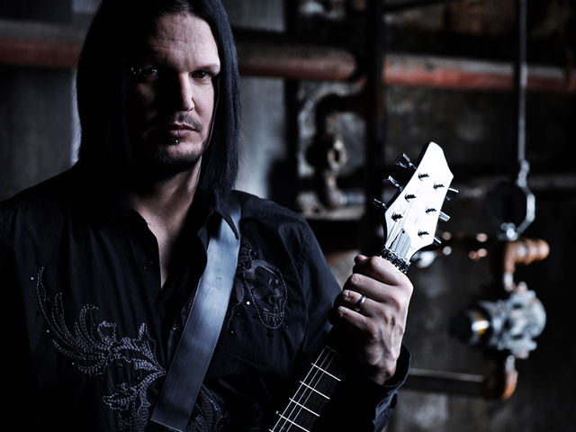 Raising fists and devil's horn signs on the new CD